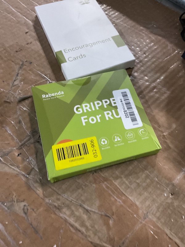 Photo 1 of Rabenda 12 Pcs Rug Tape, Non Slip Rug Pads Grippers for Hardwood Floors and Tiles, Reusable Carpet Tape for Area Rugs, Double-Sided Adhesive Rug Stickers Keep Corners Flat (Black)