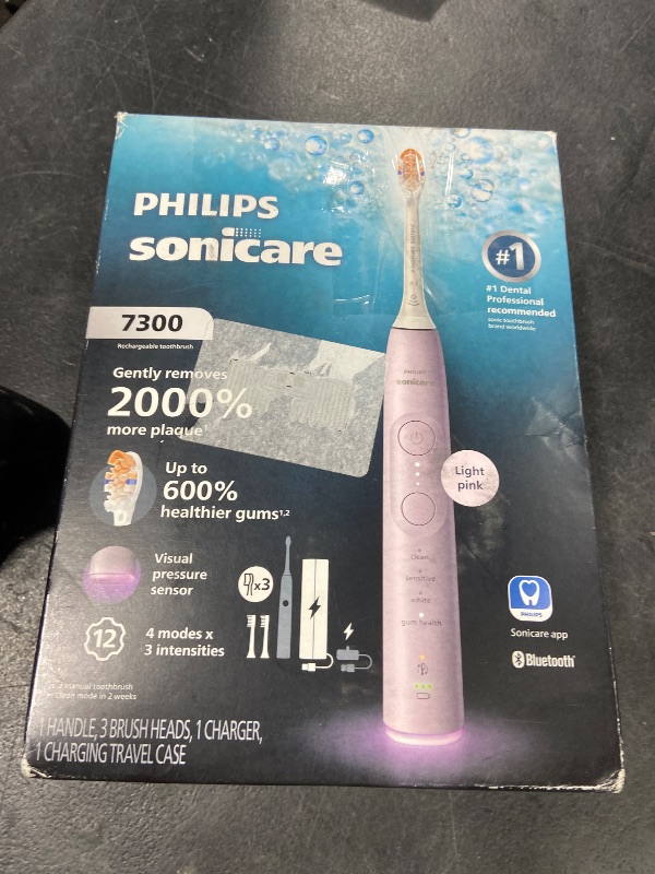 Photo 1 of Philips Sonicare 7300 Series Electric Toothbrush - Next-Generation Sonicare Technology, Pressure Sensor, 12 Brushing Settings, SmarTimer, 21-Day Runtime, Travel Case, Light Pink, HX7422/04