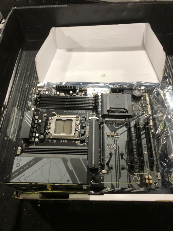 View 4 of *****NONFUNCTIONAL, FOR PARTS ONLY******
GIGABYTE B650 Eagle AX AM5 LGA 1718 AMD B650 ATX Motherboard, DDR5, Triple M.2 (1x PCIe 5.0 M.2 + 2X PCIe 4.0 M.2), USB 3.2 Gen2x2 Type-C, AMD Wi-Fi 6E, Realtek GbE LAN