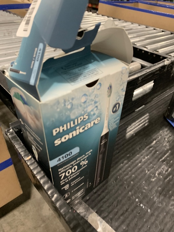 Photo 1 of Philips Sonicare 4100 Series Electric Toothbrush - Sonic Toothbrush with Advanced Sonic Technology, Pressure Sensor, Two Intensity Settings, Smartimer & Quadpacer, Black, Model HX3681/24