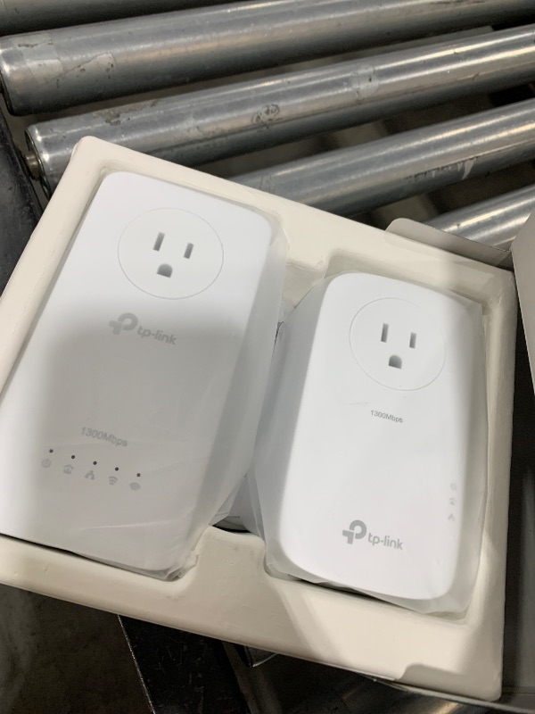 Photo 1 of TP-Link Powerline WiFi Extender TL-WPA8631P KIT- Includes AV1300 Powerline Network Adapter and AC1200 Dual Band Extender, 2x2 MIMO, 3 Gigabit Ports, Passthrough, Plug & Play, Free Expert Support