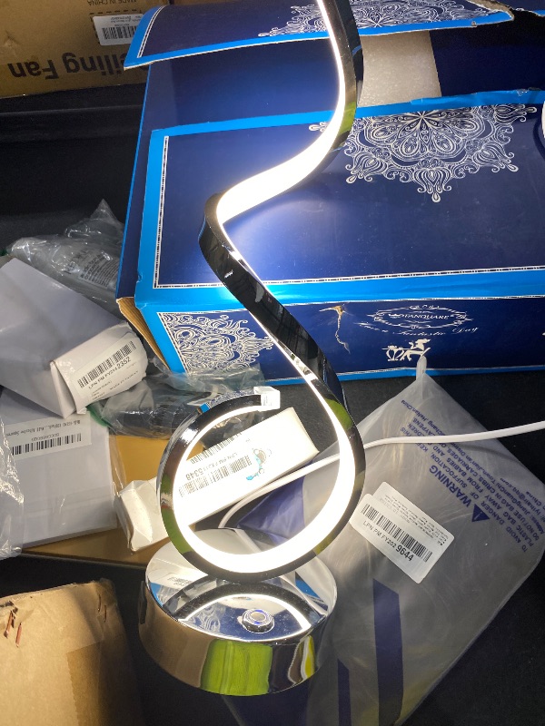 Photo 1 of BESKETIE Modern Spiral LED Table Lamp Set of 2, 10W Touch Control Table Lamp with USB Charging Ports, Dimmable 3 Color Modes Bedside Nightstand Desk Lamp Light for Bedroom, Living Room, Office -Silver