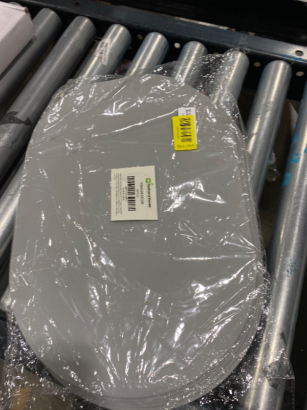 Photo 1 of Restaurantware-16 Inch Table Placemats, 6 Oval Vinyl Placemats - Embossed, Stain-Resistant, Gray Vinyl Placemats For Tables, Leather-Like Feel, Protects Surfaces