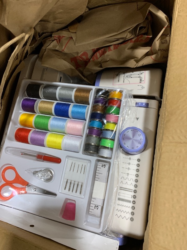 Photo 1 of Stoigeld Sewing Machine for Beginners with 20Pcs Fabric & 32Pcs Sewing Threads Kit,Portable Sewing Machine with 12 Built-in Stitches & 2 Speed(High-Low Speeds)-BW725