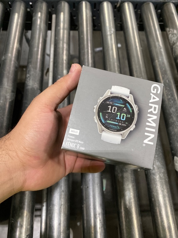 Photo 1 of Garmin f?nix® 8 – 43mm, AMOLED, Premium Multisport GPS Smartwatch, Long-Lasting Battery Life, Dive-Rated, Built-in LED Flashlight, Silver with Whitestone Band
