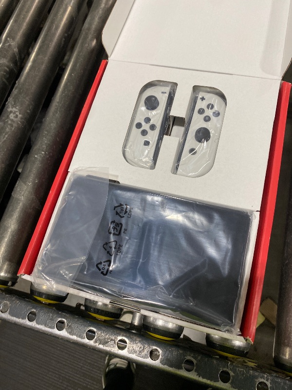Photo 1 of Nintendo Switch – OLED Model w/White Joy-Con