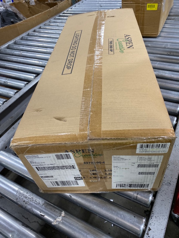 Photo 1 of Aspen Creative 62732-05-4, Four-Light Metal Bathroom Vanity Wall Light Fixture, 30 1/8" Wide, Transitional Design in Oil Rubbed Bronze with Clear Glass Shade