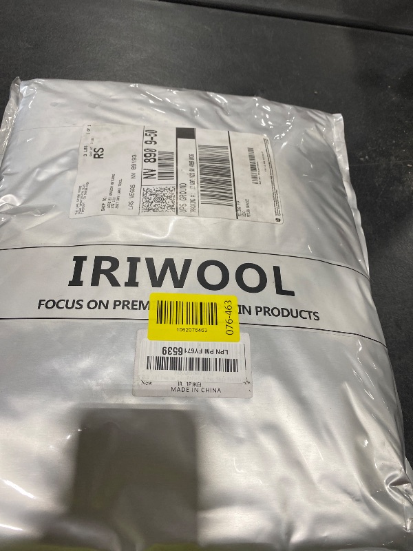 Photo 1 of IRIWOOL Premium Genuine Fur Sheepskin Rug Real Australia Sheepskin Natural Luxury Fluffy Lambskin Fur Area Rug Seat Covers for Kids Bedroom Sofa Chair Cover (Creamy White, Single Pelt/2ft x 3ft)