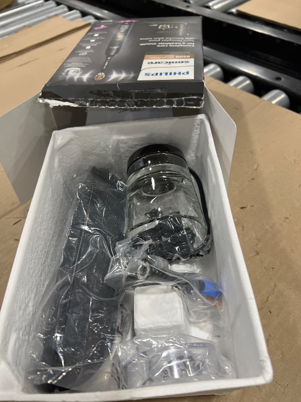 Photo 1 of Philips Sonicare DiamondClean Smart 9500 Electric Toothbrush, Sonic Toothbrush with App, Pressure Sensor, Brush Head Detection, 5 Brushing Modes and 3 Intensity Levels, Black, Model HX9923/11