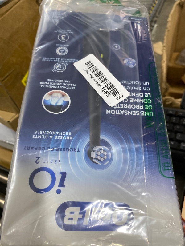 Photo 1 of Oral-B Rechargeable Electric Toothbrush, iO2 Starter Kit, 3 Cleaning Modes, Automatic Pressure Sensor to Protect Gums, 2 Brush Heads, Night Black