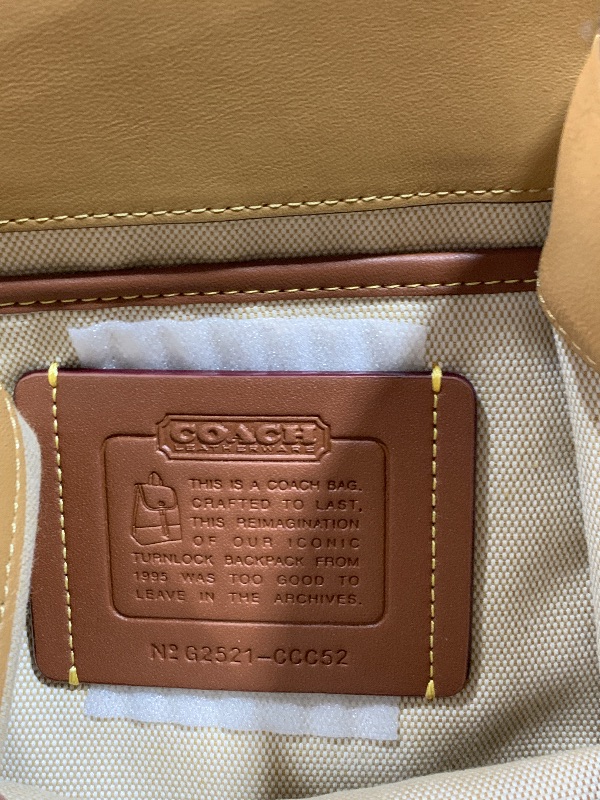 Photo 1 of COACH Women's Turnlock Backpack Honey Brown One Size