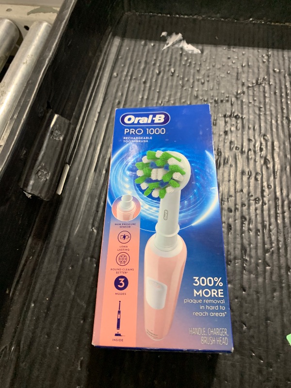 Photo 1 of Oral-B Pro 1000 Rechargeable Electric Toothbrush, Pink