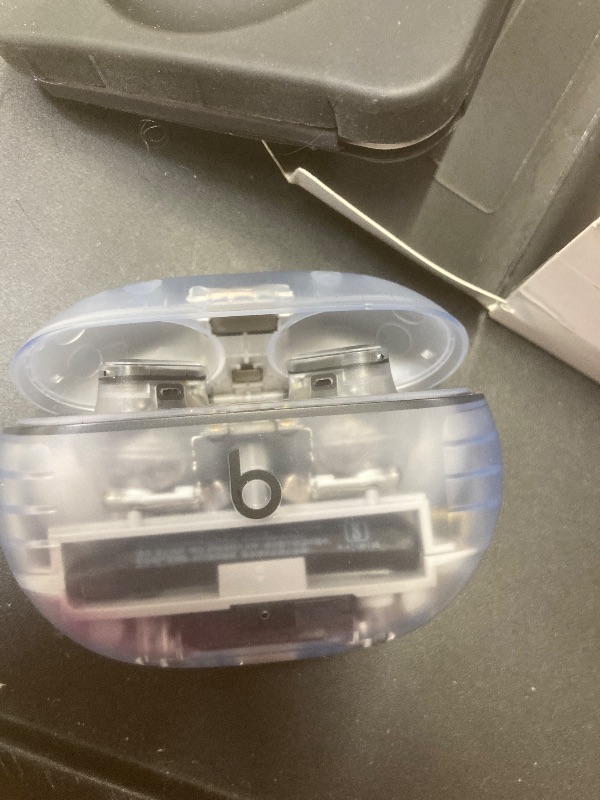 Photo 1 of ***LEFT SIDE NOT WORKING PROPERLY**CHARGER CORD MISSING****Beats Studio Buds + | True Wireless Noise Cancelling Earbuds, Enhanced Apple & Android Compatibility, Built-in Microphone, Sweat Resistant Bluetooth Headphones, Spatial Audio - Transparent***LEFT 