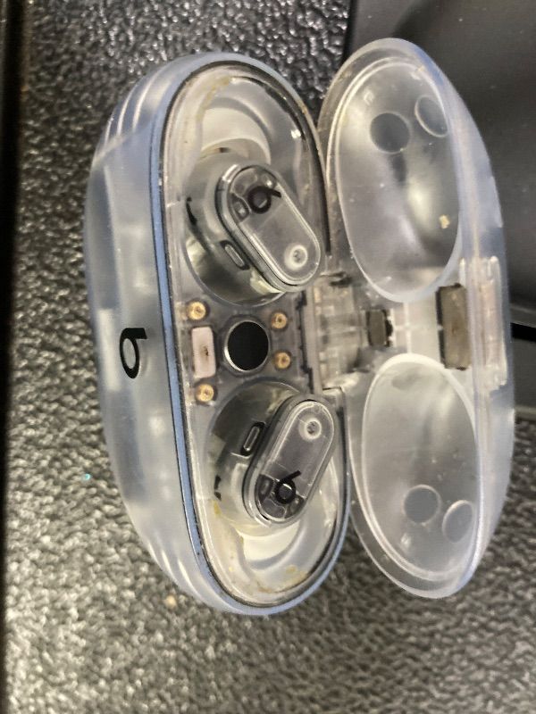 Photo 1 of ***LEFT SIDE NOT WORKING PROPERLY**CHARGER CORD MISSING****Beats Studio Buds + | True Wireless Noise Cancelling Earbuds, Enhanced Apple & Android Compatibility, Built-in Microphone, Sweat Resistant Bluetooth Headphones, Spatial Audio - Transparent***LEFT 