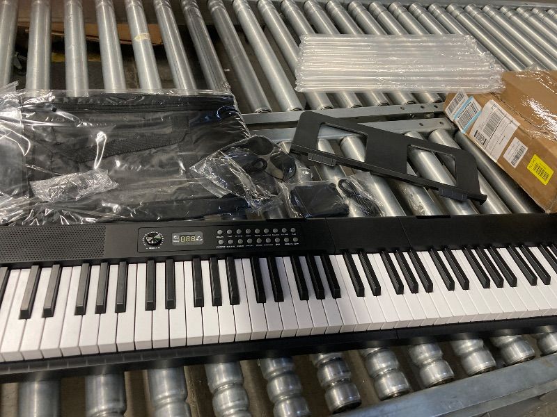Photo 1 of **MISSING PARTS***88 Key Piano Keyboard, Electric Digital Piano with Semi Weighted Keys, Keyboard Piano with Sustain Pedal, Power Supply, Stand, Carrying Case, Headphones, USB-MIDI Compatibility, for Beginner Adults