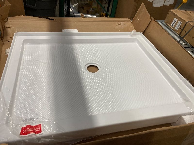 View 9 of ***2 CORNERS ARE CHIPPED***DreamLine SlimLine 34 in. D x 42 in. W x 2 3/4 in. H Center Drain Single Threshold Shower Base in White, DLT-1134420***2 CORNERS ARE CHIPPED***