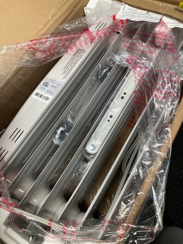 Photo 1 of ***DAMAGE POWER CORD*** PELONIS Radiator Heater for Large Space, Electric Oil Filled Radiator, Dual Knobs, 1500W, Quiet Space Heater, 3 Modes, Tip-over Protection