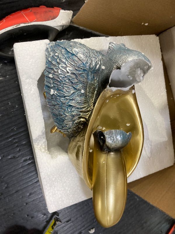 Photo 1 of ***BROKEN***PlivBloom Pelican Key Holder Statues,Fun Animal Hippo Candy Dish,Candy Dish for Office Desk Unique,Modern Key Holder for Pelican Figurine,Suitability Desk candy bowl and Entry Table Decor Items(Gold1)***BROKEN***