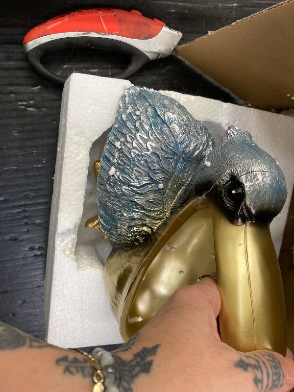 Photo 1 of ***BROKEN***PlivBloom Pelican Key Holder Statues,Fun Animal Hippo Candy Dish,Candy Dish for Office Desk Unique,Modern Key Holder for Pelican Figurine,Suitability Desk candy bowl and Entry Table Decor Items(Gold1)***BROKEN***