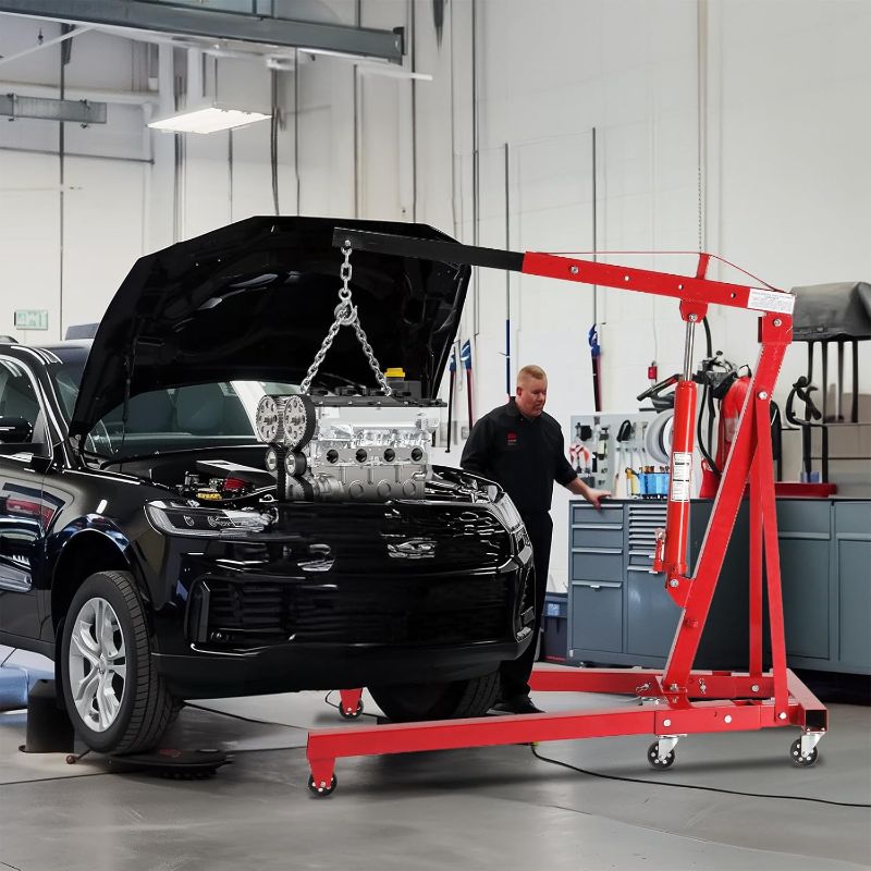 Photo 1 of 
2 Ton Hydraulic Engine Hoist Crane, 4400LBS Folding Heavy-Duty Cherry Picker Engine Hoist with 6 Locking Wheels & 4 Boom Positions for Truck SUV Engines Garage Workshop