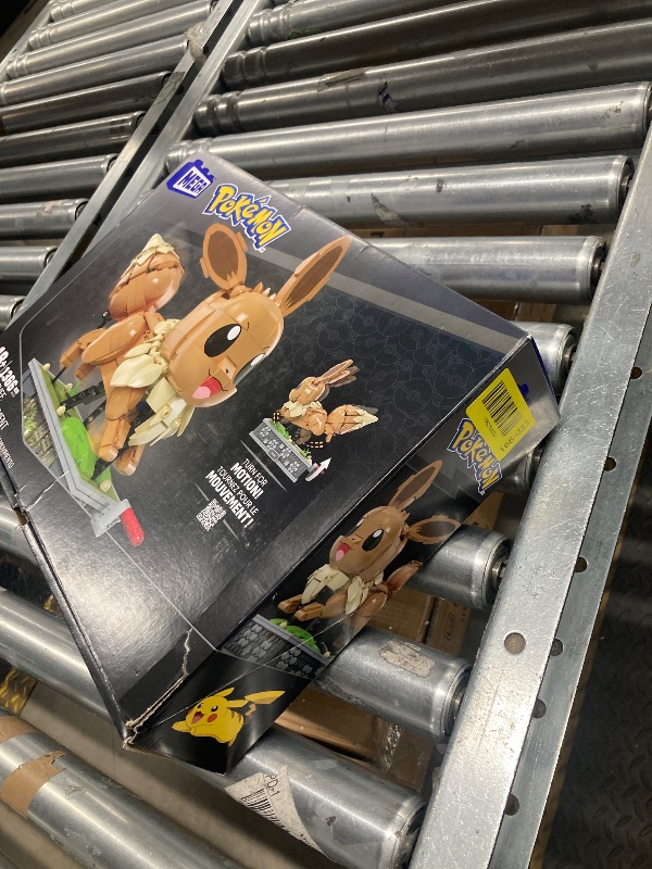 Photo 1 of ?MEGA Pokémon Action Figure Building Set, Motion Eevee with 1366 Pieces, Turn Crank for Running Movement, Build & Display Toy for Collectors