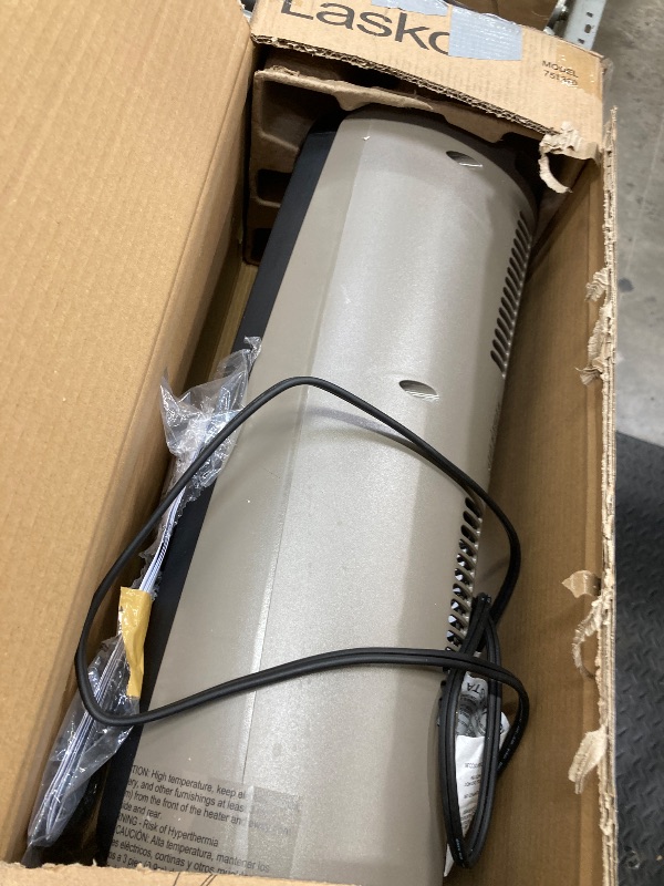 Photo 1 of **its doesnt work**Lasko 1500W Ceramic Tower Space Heater with Remote, Thermostat, Timer & Widespread Oscillation, Portable Electric Heater for Indoor Use, Bedroom & Living Room, 751320