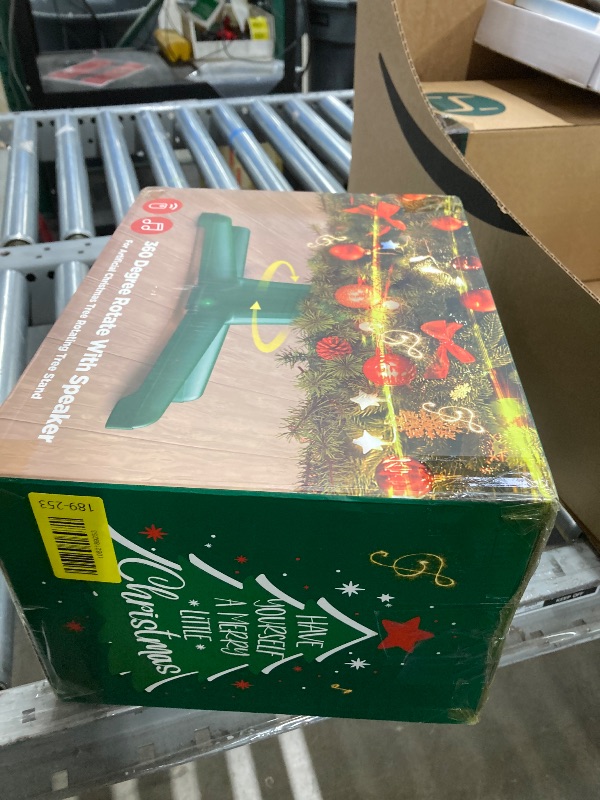 Photo 1 of ?Patent Pending? Musical Rotating Christmas Tree Stand, UL Certified Up to 9ft 120 lb Artificial Christmas Tree with Speaker, Spinning Stand with Remote, Fit for 1.25-2" in Tree Poles - 800W