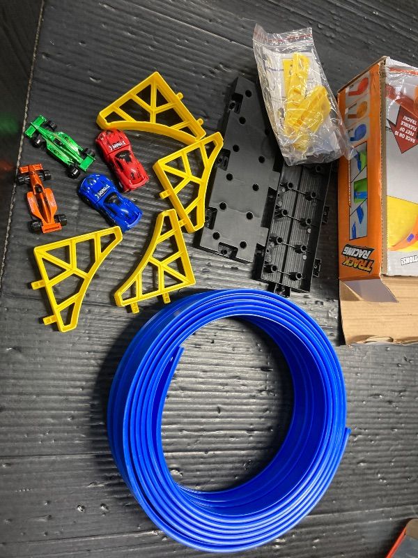 Photo 1 of ***WHAT YOU SEE IS EVERYTHING INCLUDED*NOTHING ELSE***Flexible Race Track for Kids, 15 FT Dual Lane DIY Flex Track with 4 Cars & Suction Cup Car Ramp, Bendable Toy Racing Track Set for Toddlers Ages 3+***WHAT YOU SEE IS EVERYTHING INCLUDED*NOTHING ELSE***