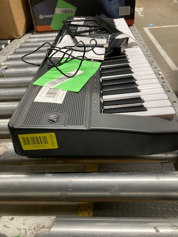 Photo 1 of *Missing mic* Furnibear 61 Key Piano Keyboard with Music Sheet Stand, Microphone, 200 Tones & Rhythms

