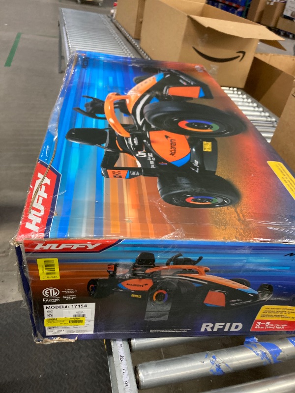 Photo 1 of **MISSING PARTS/NO REMOTE**Huffy 12V McLaren Formula 1 Kids Ride-on Car with Remote Control Ages 3–5 Black - One Unit