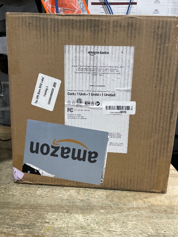 Photo 1 of **NON FUNITIONAL** Amazon Basics 8-Sheet High Security Cross Cut Paper and Credit Card Shredder with P-4 Security, Auto Shut-off, Black