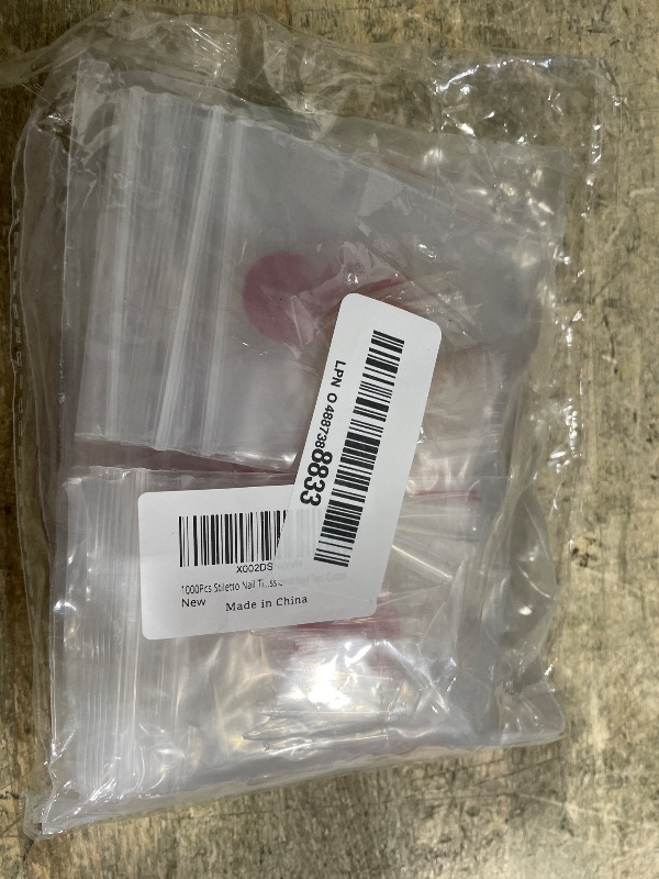 Photo 1 of 1200 Pieces Stiletto Nail Tips Clear Long Fakes Nails Half Cover False Nail Tips for Acrylic Nails