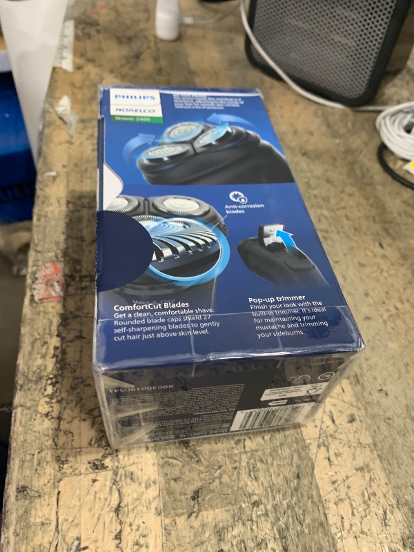 Photo 1 of **MISSING POWER (CHARGING CORD)** Philips Norelco Shaver 2400 Series, Wet and Dry Electric Shaver, Pop-up Trimmer, P-Cap, Deep Black, Model X3001/90