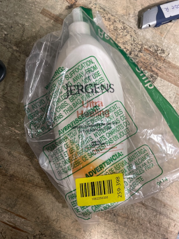 View 2 of *BROKEN CAP* Jergens Ultra Healing Dry Skin Lotion, Hand and Body Moisturizer for Quick Absorption into Extra Dry Skin with Hydralucence Blend, Vitamins C, E and B5, White, 32oz