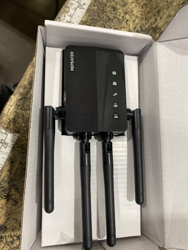 Photo 1 of 1200Mbps Dual Band 5GHz/2.4GHz WiFi Extender, WiFi Extender Signal Booster, 12880 Sq.Ft Coverage, 105-Device Support, Setup for Home & Outdoor Use