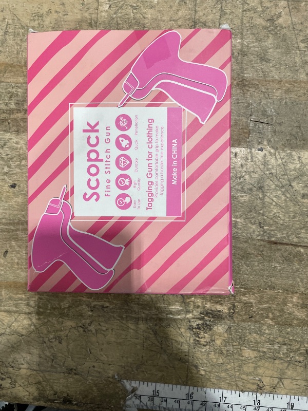 Photo 1 of Stitch For Clothes - Handheld Stitch Tag Gun Quick Clothing Fixer - Tagging Gun - Sewing Kit Includes 6 Needle, 1000 Black Fasteners ? 1000 White Fasteners (Black-Orange)