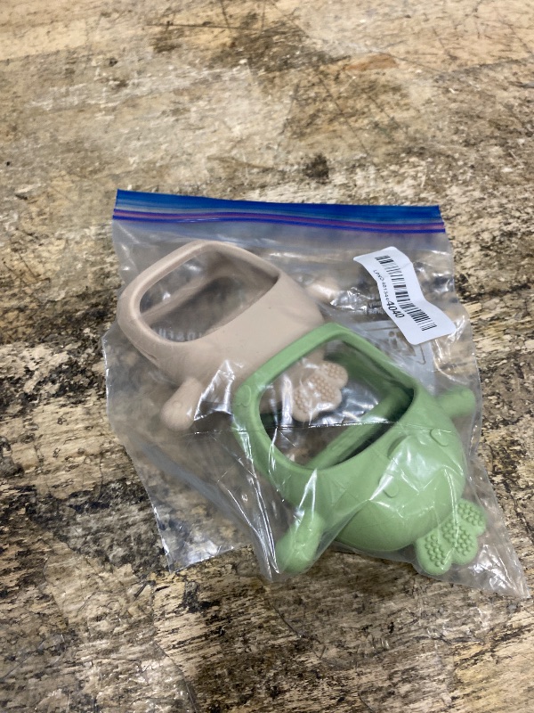 Photo 1 of 2 Pack Baby Teething Toy Silicone Teething Mitten for Babies Over 3 Months Anti Dropping Wrist Hand Teethers Baby Chew Toys for Sucking Needs, BPA Free (Green & Caramel)