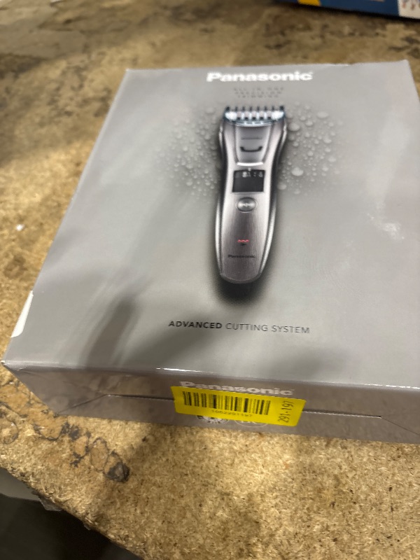 Photo 1 of **USED/HAIR**
Panasonic Multi-Groomer Electric Beard Trimmer for Men, Men’s Trimmer for Beard, Hair and Body, 39 Trim Length Settings with 3 Attachments, Corded/Cordless Operation – ER-GB80-S (Silver)