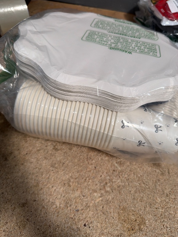 Photo 1 of  black bow party supplies (cups, forks, spoons ,plates