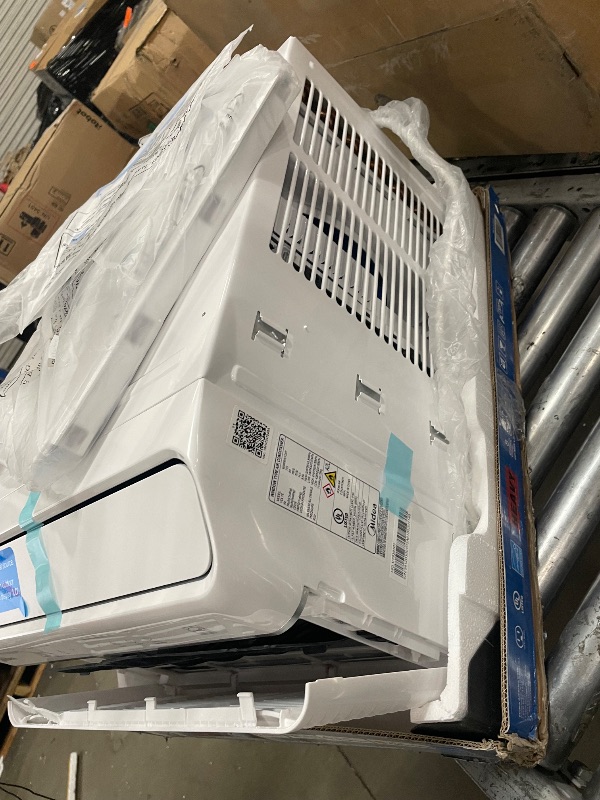 Photo 1 of *DOES NOT TURN ON* Midea 8,000 BTU Smart Inverter Air Conditioner Window Unit with Heat and Dehumidifier – Cools up to 350 Sq. Ft., Energy Star Rated, Quiet Operation, Electronic Controls, Remote Control, White