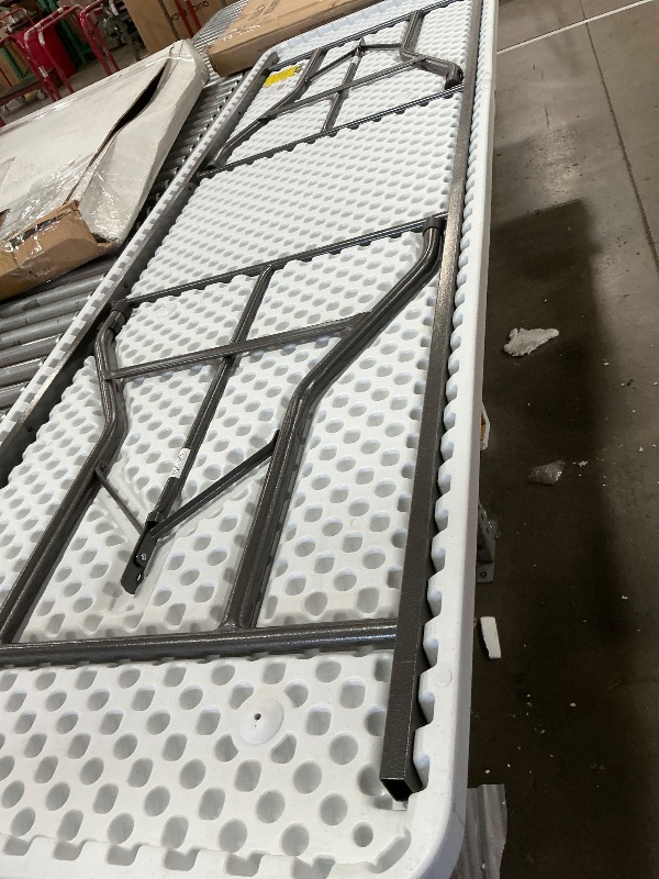 Photo 1 of -8 Foot Commercial Grade Plastic Table
