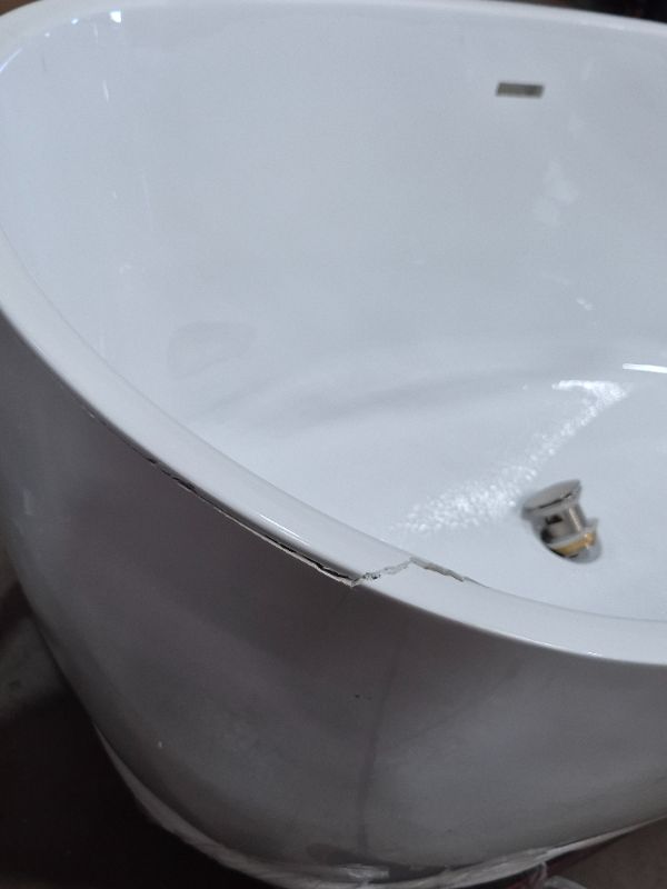 Photo 1 of **************HAS A CRACK ALONG THE RIM (2ND PIC)*************
WOODBRIDGE 59"Freestanding White Acylic Soaking Bathtub with Brushed Nickel Drain and Overflow,BTA1518 -B/N-Drain &O