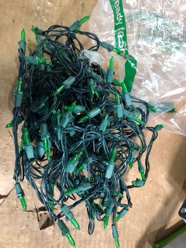 Photo 1 of ***DAMAGED - SEE NOTES/PICTURES***
Brizled Green Christmas Lights, 33ft 100 LED Christmas String Lights, 120V UL Certified Plugin Xmas Tree Light Connectable Waterproof Mini Xmas Light for Home Tree Halloween Indoor Outdoor Decorations