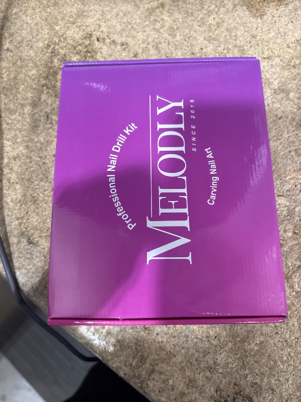 Photo 1 of Electric Nail Drill File Professional 40000 RPM, Melodly Rechargeable Electric Nail File Machine Kit for Acrylic Gel Nails Polishing Removing, Portable Cordless Efile with Gold Bits Kit at Salon Home