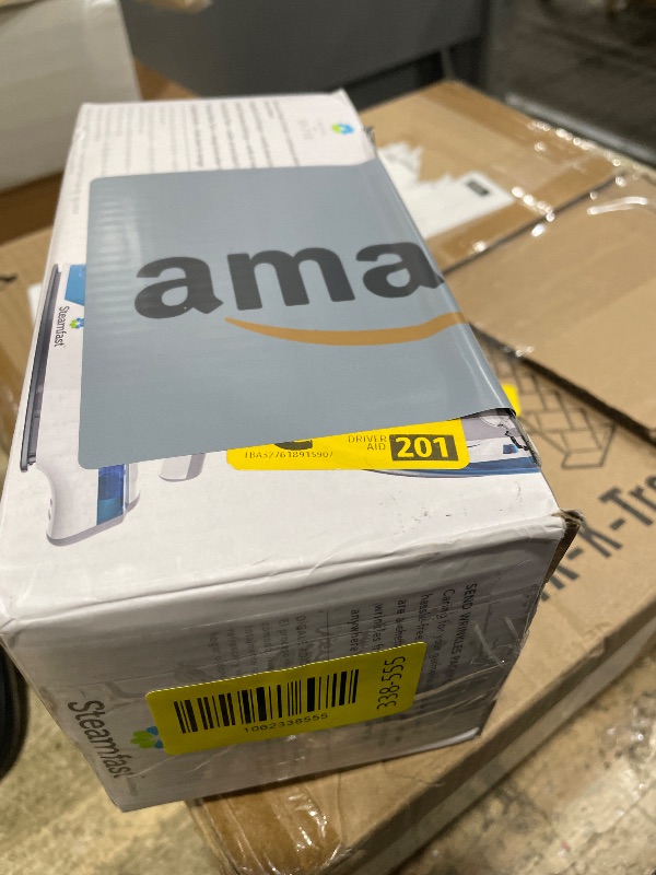 Photo 1 of Steamfast SF-710 Mini Steam Iron, Non-Stick Sole Plate, Foldable Handle, 45 Second Heat Up Time, Cord Storage, Portable, 6-Foot Power Cord, Chemical-Free Steam Power, White