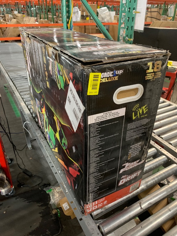 Photo 1 of *** PARTS ONLY ***  heavily damaged, missing steering wheel and control board is damaged*SOLD FOR PARTS*ARCADE1UP The Fast & The Furious Deluxe Arcade Game for Your Home, with 5-Foot-Tall Stand-up Cabinet, 2 Classic Games, and 17-inch LCD Screen