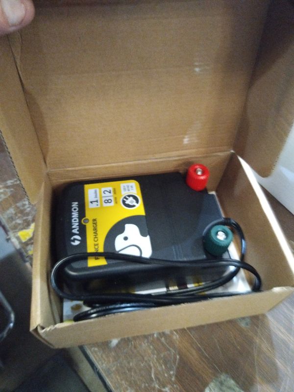 Photo 1 of 0.12 Joule Electric Fence, AC-Powered Electric Fence Charger for 2 Miles & 8 Acre Protection, Electric Fence Energizer Ideal for Gardens, Backyards & Small Livestock