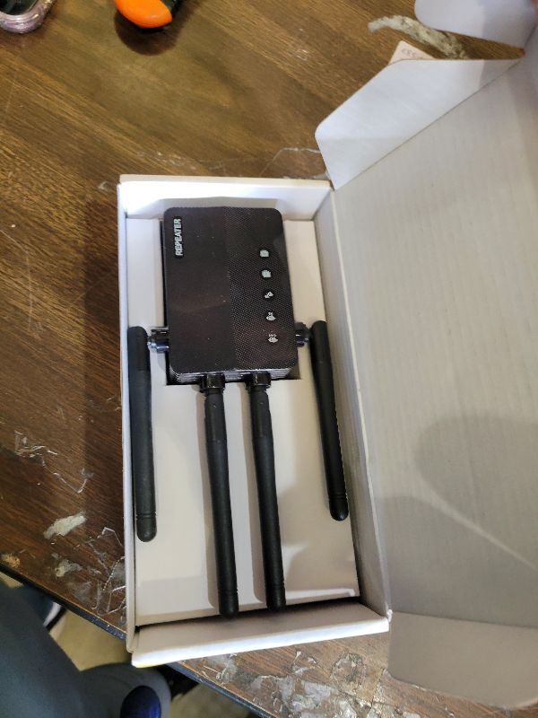 Photo 1 of 1200Mbps Dual Band 5GHz/2.4GHz WiFi Extender, WiFi Extender Signal Booster, 12880 Sq.Ft Coverage, 105-Device Support, Setup for Home & Outdoor Use