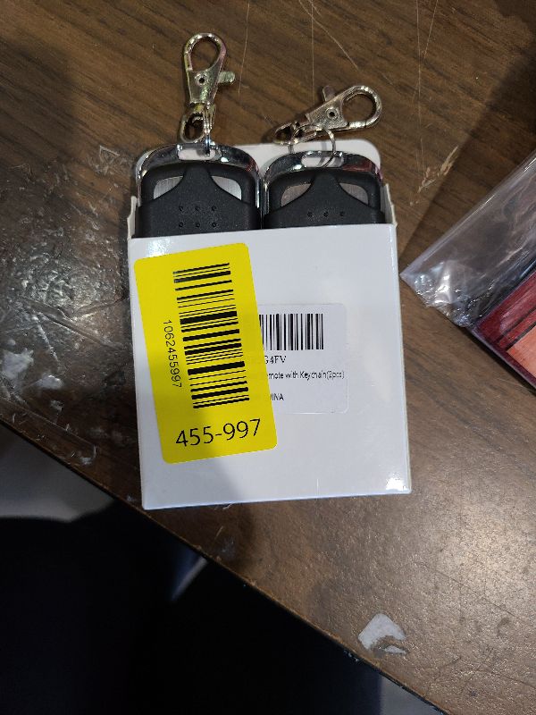 Photo 1 of 2 Pcs Universal Garage Door Opener Remote Keychain 4-Button Programmable Compatible with Liftmaster Chamberlain Craftsman Opener with Purple Yellow Red Orange Green Learn Button