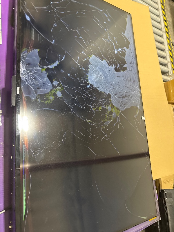 Photo 1 of **DAMAGED, SOLD FOR PARTs** Roku Smart TV 2025 – 50-Inch Select Series, 4K HDR TV – RokuTV with Enhanced Voice Remote – Flat Screen LED Television with Wi-Fi for Streaming Live Local News, Sports, Family Entertainment